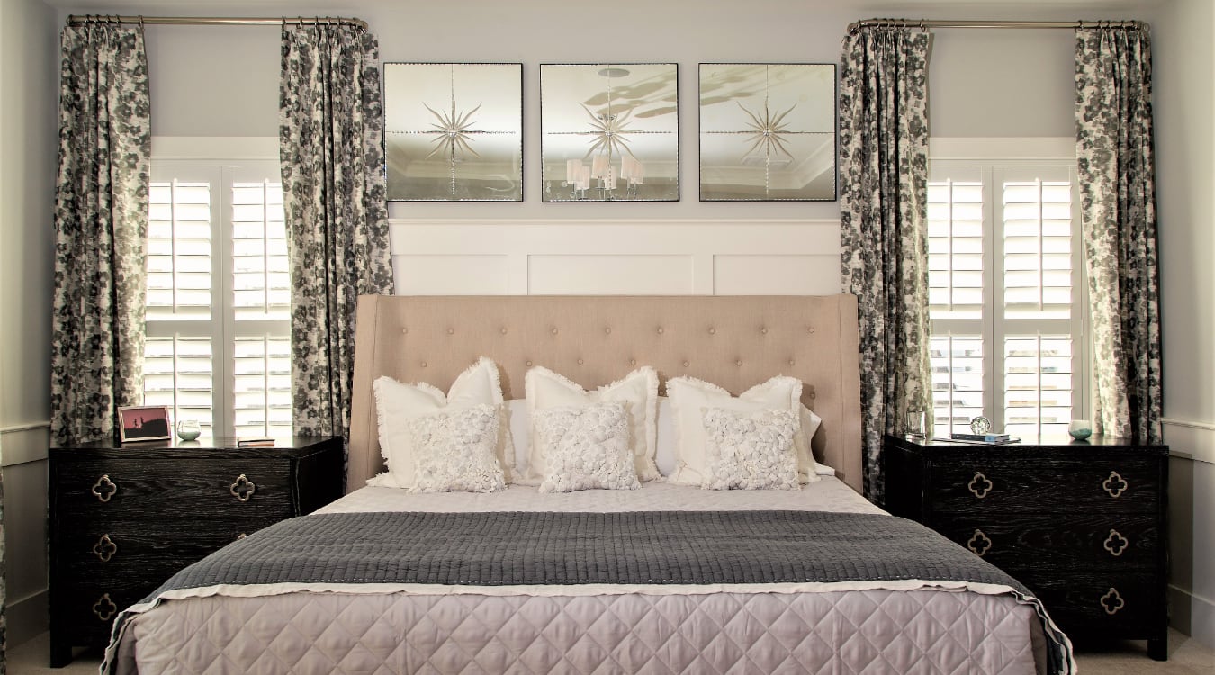 Plantation shutters in a bedroom